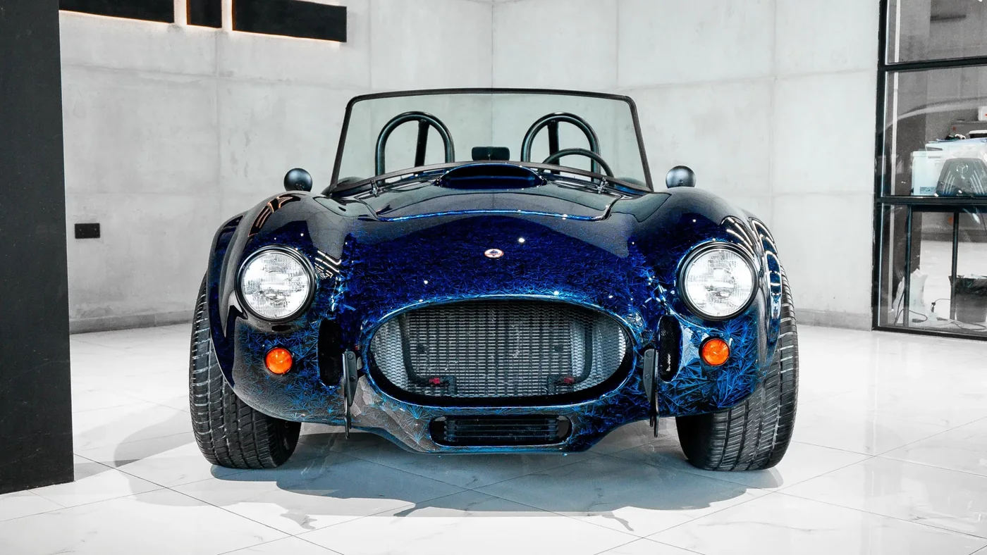 Ford Cobra after repaint with a blue crystal-pattern finish at DEIZ