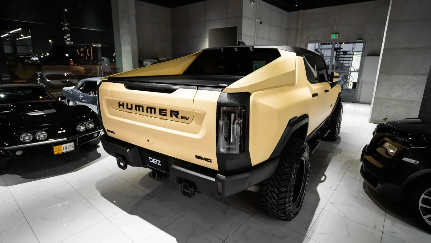 GMC Hummer EV after repaint in a custom sand protective finish at DEIZ