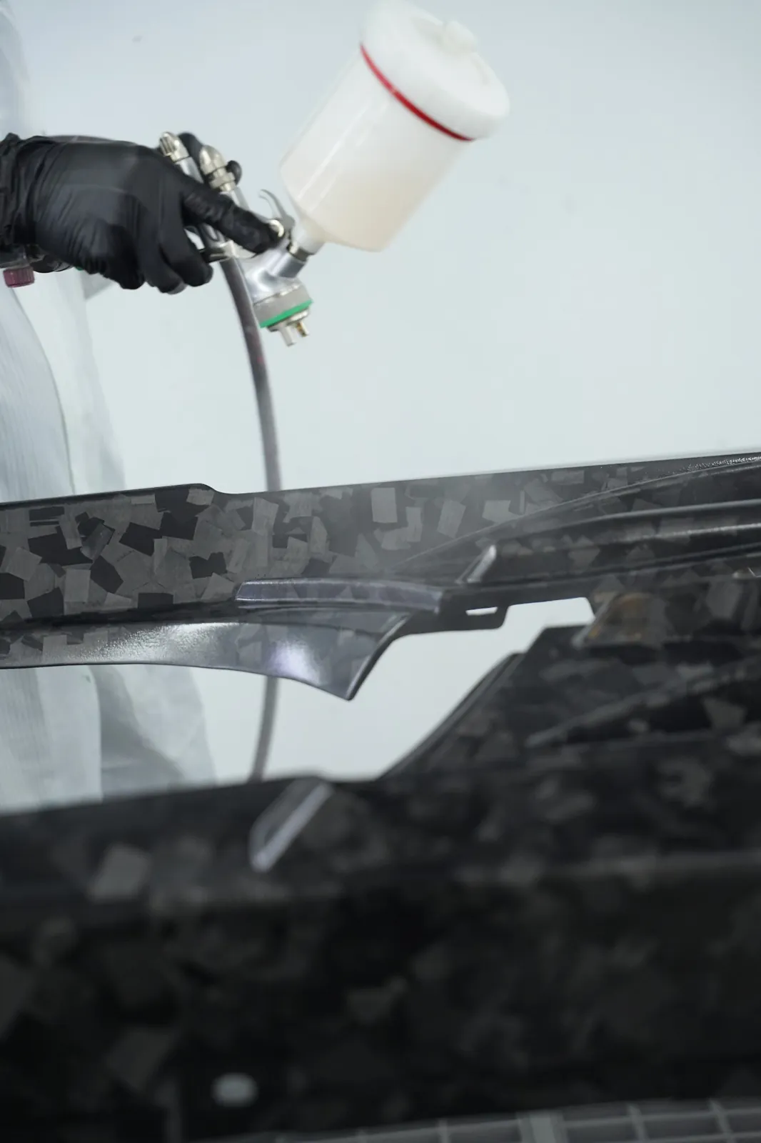 Precision spray application on detailed automotive components at DEIZ Garage